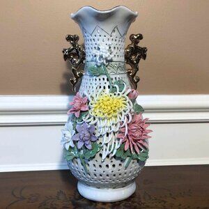 Reticulated chrysanthemum porcelain vase with gilded handles